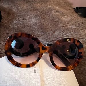 Pre-Owned- Prada Swirl Sunglasses
